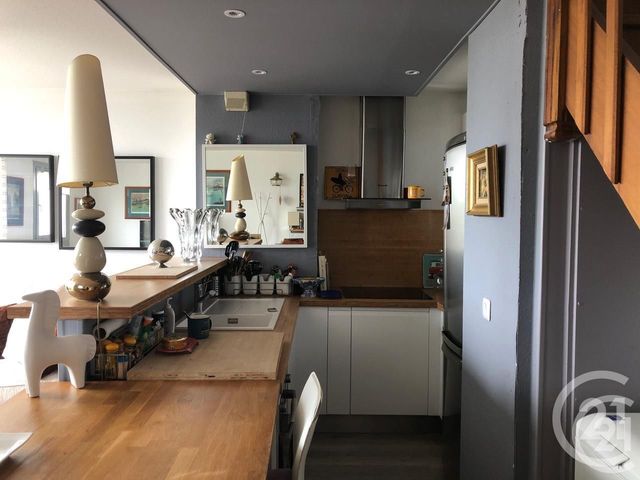 Afficher la photo en grand Appartement à vendre - 3 pièces - 55.44 m2 - LE GRAU DU ROI - 30 - LANGUEDOC-ROUSSILLON - Century 21 Rouvière Immobilier
