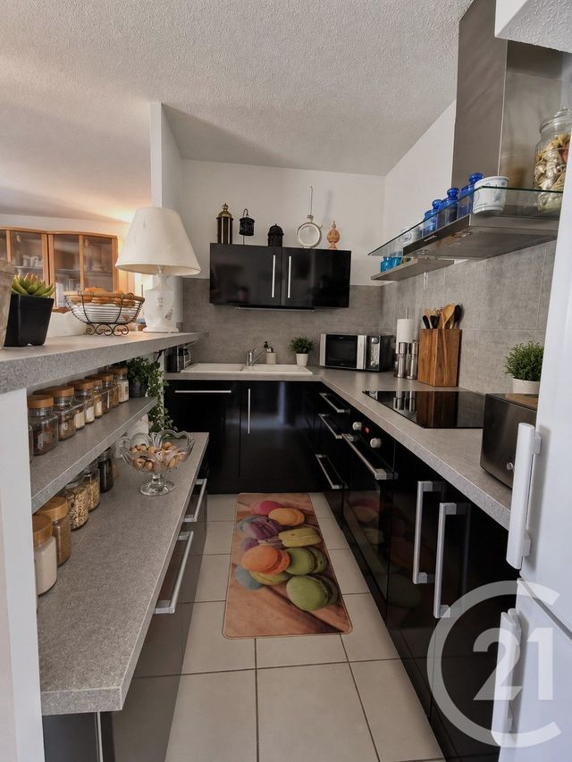 Appartement F3 à vendre - 3 pièces - 52.4 m2 - LE GRAU DU ROI - 30 - LANGUEDOC-ROUSSILLON - Century 21 Rouvière Immobilier
