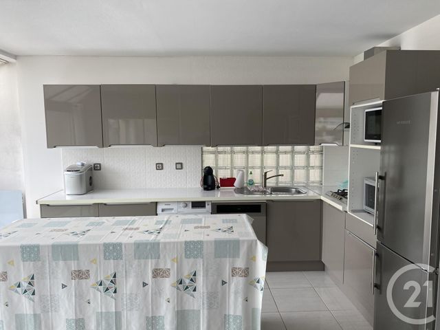 Appartement F3 à louer - 3 pièces - 64.04 m2 - LE GRAU DU ROI - 30 - LANGUEDOC-ROUSSILLON - Century 21 Rouvière Immobilier