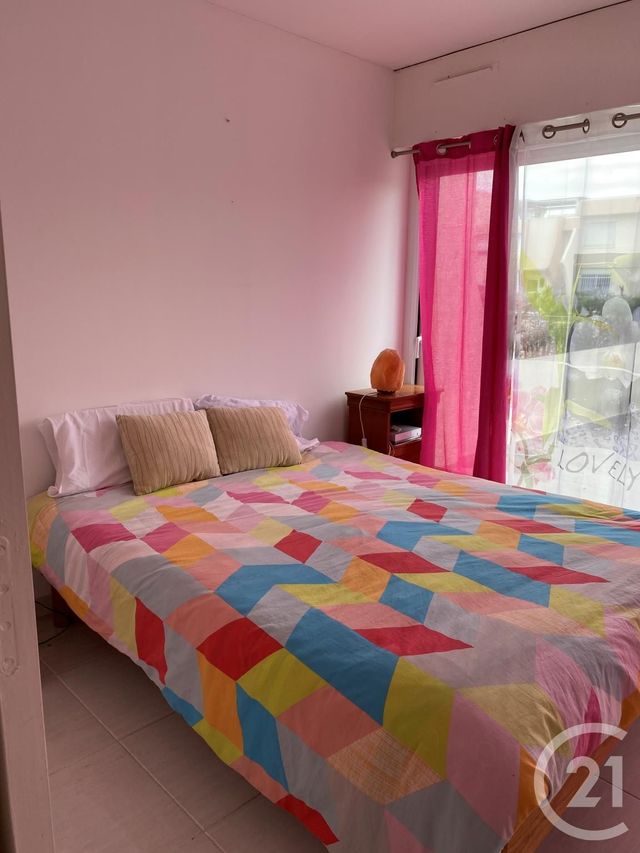 Appartement F3 à louer - 3 pièces - 64.04 m2 - LE GRAU DU ROI - 30 - LANGUEDOC-ROUSSILLON - Century 21 Rouvière Immobilier