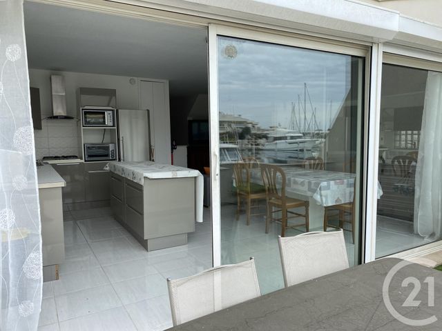 Appartement F3 à louer - 3 pièces - 64.04 m2 - LE GRAU DU ROI - 30 - LANGUEDOC-ROUSSILLON - Century 21 Rouvière Immobilier